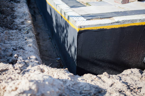 Professional Waterproofing technician working in Milwaukee, WI